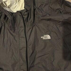 Women’s medium North Face light weight rain coat